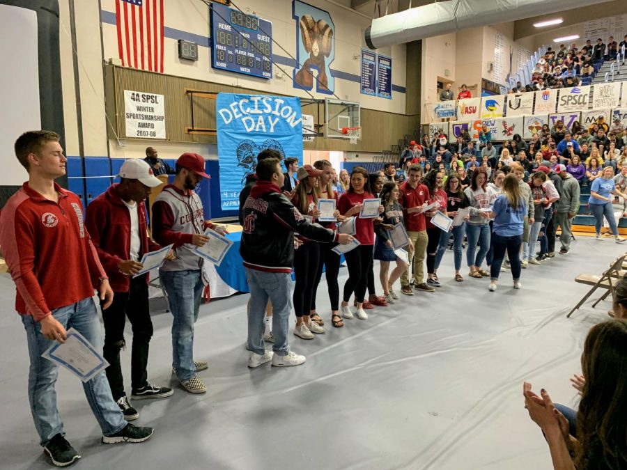 Students headed to Washington State University line up at Decision Day 2019.