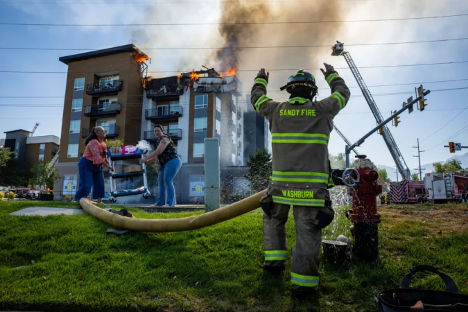 Midvale North Union Apartments Tenants Press Managers for Answers After July 31 Fire Displaced More Than 160 Units and Left Residents Fighting Over Lost Belongings Tenants gather outside Midvale's North Union Apartments after a late July fire damaged the complex