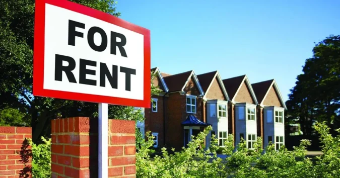 Charleston-Area Apartment Renters Face $225 to $390 in One-Time Fees and $162.50 to $330 More Each Month Before Housing Costs Even Start Apartment building exterior with a renter reviewing a fee list on a clipboard