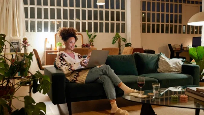 Bankrate Says Most Refinance Borrowers Still Pay Above the Best Available Rate in 2025 as Closing Costs and Break-Even Math Shape Savings A homeowner reviewing refinance paperwork next to a calculator and house keys