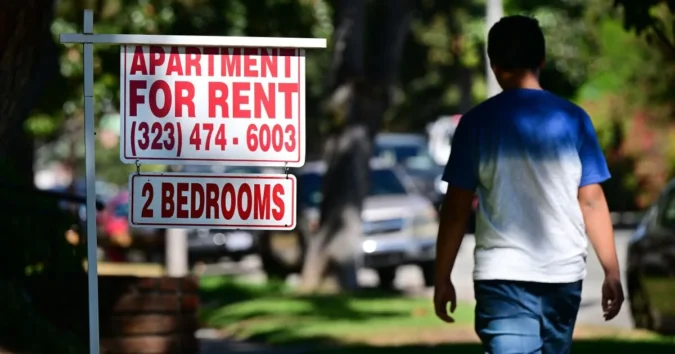 Apartment buildings and homes in Los Angeles with renters and buyers facing wide monthly cost differences