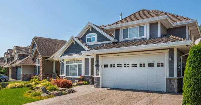 Bankrate Study Says Millions of American Homeowners Overpay on Mortgages by About $3,343 a Year as Lenders Compete Poorly on Rates A homeowner reviews mortgage paperwork with a calculator and house keys nearby
