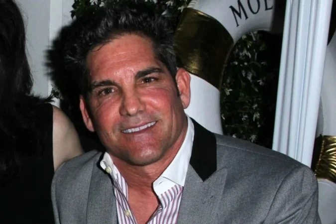 Grant Cardone speaking on a phone screen about a $5,000 house hacking strategy