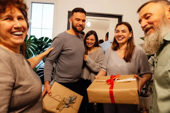 IRS-Published Family Loan Strategy Lets Parents Help Adult Children Buy Homes Without a Gift Tax Return When Annual Forgiveness Stays Under the Limit A family reviewing a promissory note and home purchase paperwork at a kitchen table