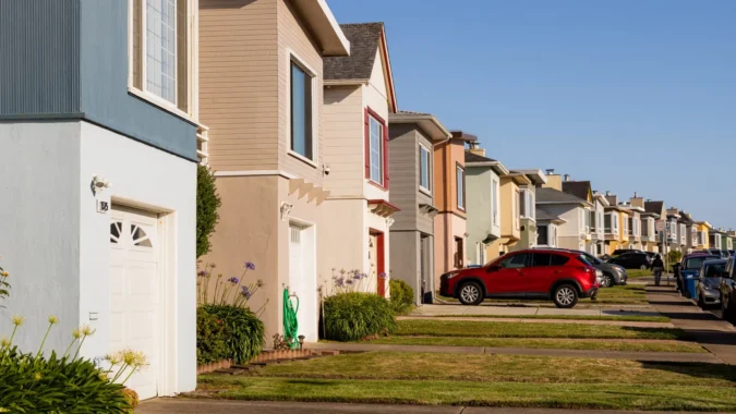 Thirty-Year Fixed Mortgage Rate Jumps to 7.45 Percent on Thursday as Treasury Yields Surge and Housing Costs Remain Pressured Nationwide A for sale sign in front of a suburban home as mortgage rates rise