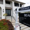 As Mortgage Rates Hover Near 7 Percent, Buyers in New York, New Jersey and the Sun Belt Are Finding More Room to Negotiate on Homes For Sale sign in front of a house as buyers look for negotiating room in a high-rate housing market