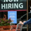 U.S. Hiring Rebounds in August as 147,000 Jobs Are Added and Mortgage Rates Edge Higher, Sending Mixed Signals to Households and Businesses A mortgage calculator beside housing paperwork and a phone showing U.S. jobs data
