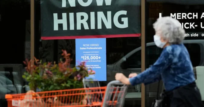 U.S. Hiring Rebounds in August as 147,000 Jobs Are Added and Mortgage Rates Edge Higher, Sending Mixed Signals to Households and Businesses A mortgage calculator beside housing paperwork and a phone showing U.S. jobs data