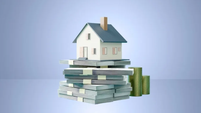 Mortgage Rates Climb to 6.91 Percent as the 10-Year Treasury Rises and Borrowers Face a Costly Incentive to Compare Lenders A house key and calculator beside mortgage rate figures on a desk