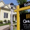 Average 30-Year Mortgage Rate Climbs to 13-Month High as Freddie Mac Reports 6.71 Percent and Housing Demand Stays Sluggish Nationwide A house for sale sign in a neighborhood as mortgage rates rise