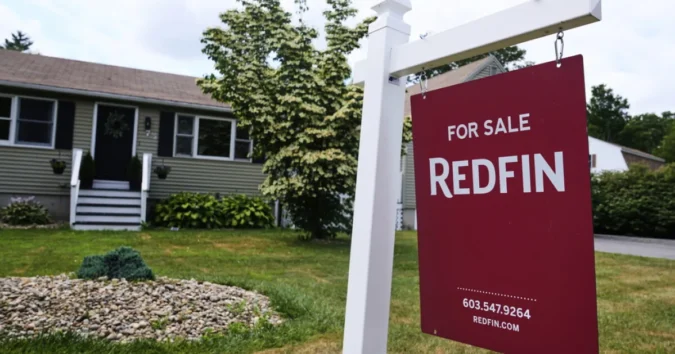 U.S. Existing Home Sales Fall to Slowest Pace in More Than a Year as Mortgage Rates and Prices Keep Climbing For sale signs line a neighborhood street as U.S. home sales slow and prices remain high