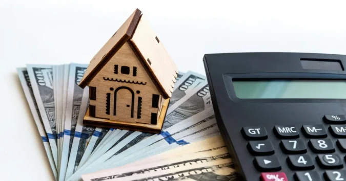 What $250,000 Home Equity Loan Payments Look Like This September as Average Rates Hold Near 8.14 Percent for Borrowers Comparing 10 and 15 Year Terms House exterior with calculator and mortgage papers representing home equity loan payments
