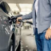 Detroit Airport Rental Car Travelers Can Save About 22 Dollars by Skipping a Gas Station Charging 5.74 a Gallon Near the Return Lot Gas price sign near an airport rental car return area showing a high per-gallon rate