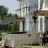 U.S. Home Buyers Face Near 7 Percent Mortgage Rates as Freddie Mac Says 30 Year Loans Jump to 6.95 Percent and Housing Costs Rise A for sale sign outside a house as mortgage rates rise near 7 percent