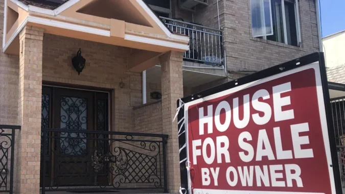 U.S. 30-Year Mortgage Rates Climb to a Two-Year High Above 7.16% as Buyers Face Larger Monthly Payments and Tighter Affordability A row of suburban homes with a for-sale sign in front of one property