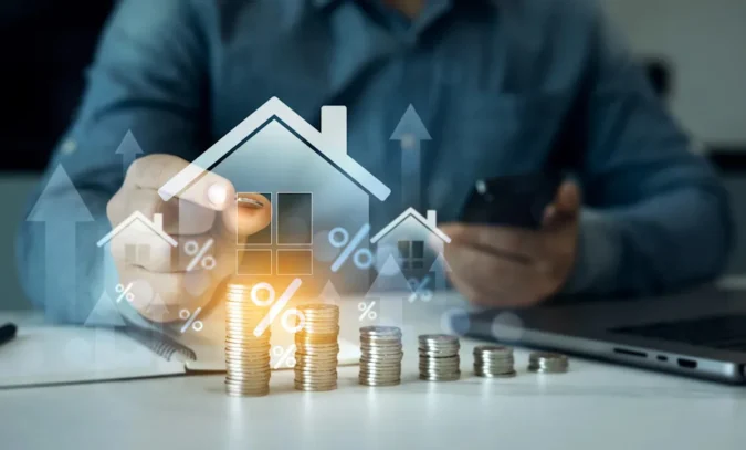 Mortgage Rates Could Ease Gradually Through 2031 as Treasury Yields and Lender Spreads Shape a Still-Elevated Outlook for Homebuyers, Refinancers, and Lenders A house key and mortgage paperwork beside a calculator and financial charts
