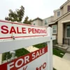 Mortgage Delinquencies Rose Fastest in Newton County, Georgia, and Nine Other Places as County Data Show Stress Signals That Could Affect Local Home Values Suburban houses in a neighborhood with a mortgage delinquency warning theme