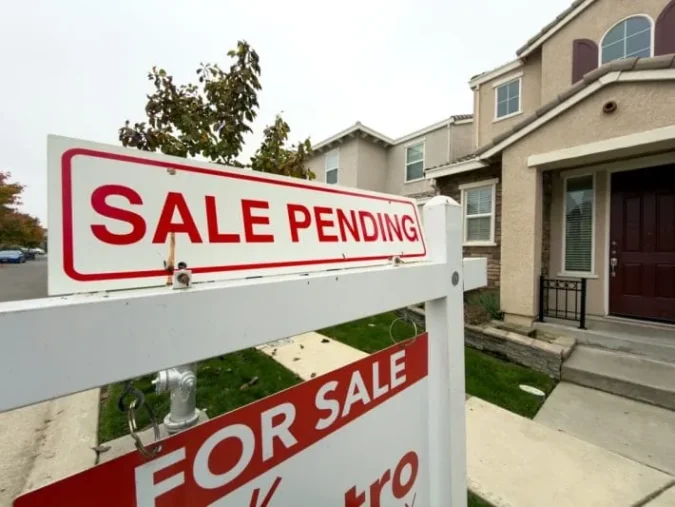 Suburban houses in a neighborhood with a mortgage delinquency warning theme