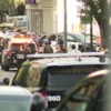 Questions Over Minnesota’s Red Flag Law and Landlord Gun Rules Grow After Downtown Minneapolis Shooting Leaves Three Dead and Six Injured in Midtown Tower Investigation Police tape and emergency vehicles near a downtown Minneapolis shooting scene