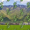 For sale signs in a neighborhood as home sellers cut asking prices to attract buyers
