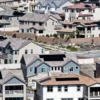 Average 30 Year Mortgage Rate Jumps to 7.28 Percent as Buyers Weigh Adjustable Loans, Buydowns and Assumable Financing Options A for sale sign in front of a suburban home as mortgage rates rise