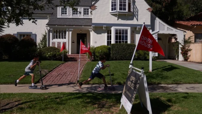 A home for sale sign in Kern County as rising mortgage rates raise monthly payments