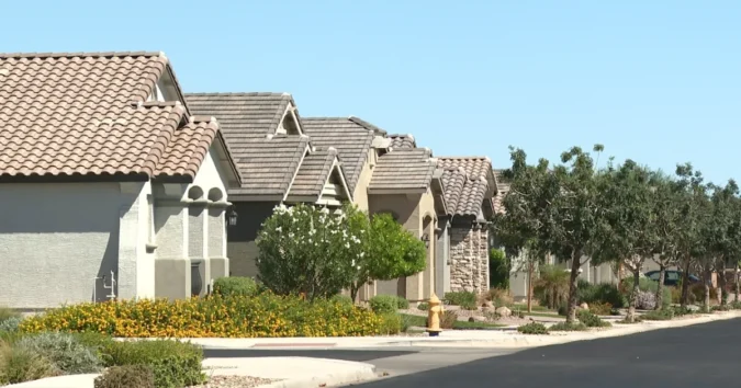 Rising Mortgage Rates Push Surprise Homebuyers to the Sidelines as Northwest Growth Continues and Builder Incentives Try to Offset Higher Monthly Costs New homes under construction in Surprise, Arizona with a real estate sign in front