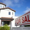Mortgage Rates Reach a 20-Month High Above 7 Percent as Oil Prices, Treasury Yields and Inflation Press U.S. Homebuyers A house for sale sign in front of a home as mortgage rates rise above 7 percent
