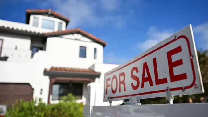 Mortgage Rates Reach a 20-Month High Above 7 Percent as Oil Prices, Treasury Yields and Inflation Press U.S. Homebuyers A house for sale sign in front of a home as mortgage rates rise above 7 percent