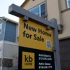 Mortgage Rates in the United States Rise for a Seventh Straight Week, Reaching 7.4 Percent and Putting More Pressure on Homebuyers Nationwide A for-sale home sign outside a house as higher mortgage rates pressure buyers