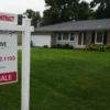 Freddie Mac Says Average 30 Year U.S. Mortgage Rate Reaches 7.40 Percent, the Highest Since November 2023, After Seventh Weekly Increase A for sale sign outside a suburban home with higher mortgage rates weighing on buyers